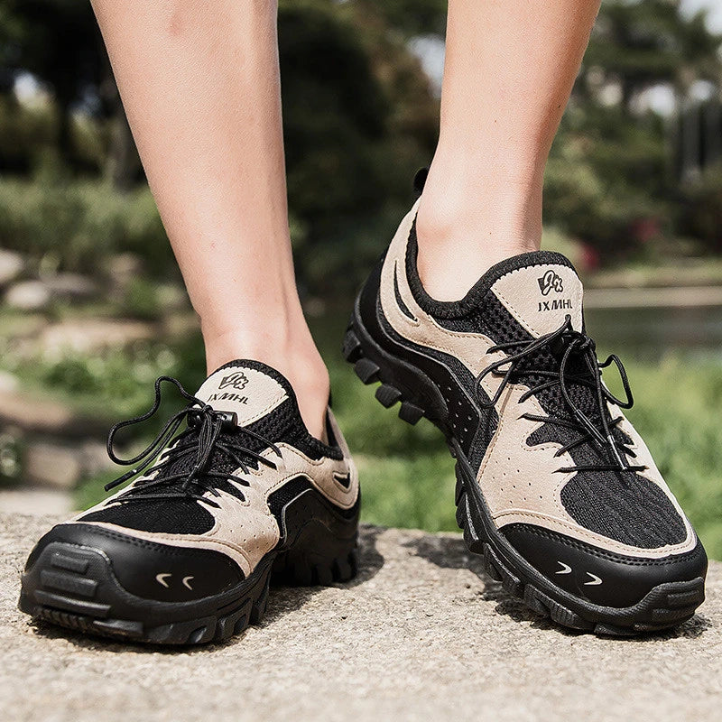Couple wearing durable British-made mesh hiking shoes exploring the outdoors