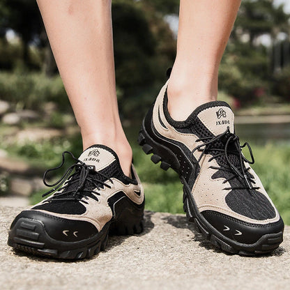 Couple wearing durable British-made mesh hiking shoes exploring the outdoors