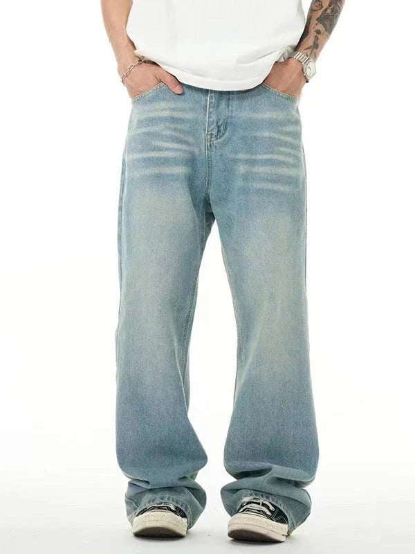Premium light blue washed relaxed fit jeans with subtle fading and distressing, made from high-quality cotton for exceptional comfort and durability.