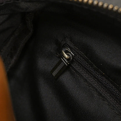 Premium leather clutch bag with multiple interior pockets, designed for the sophisticated British gentleman