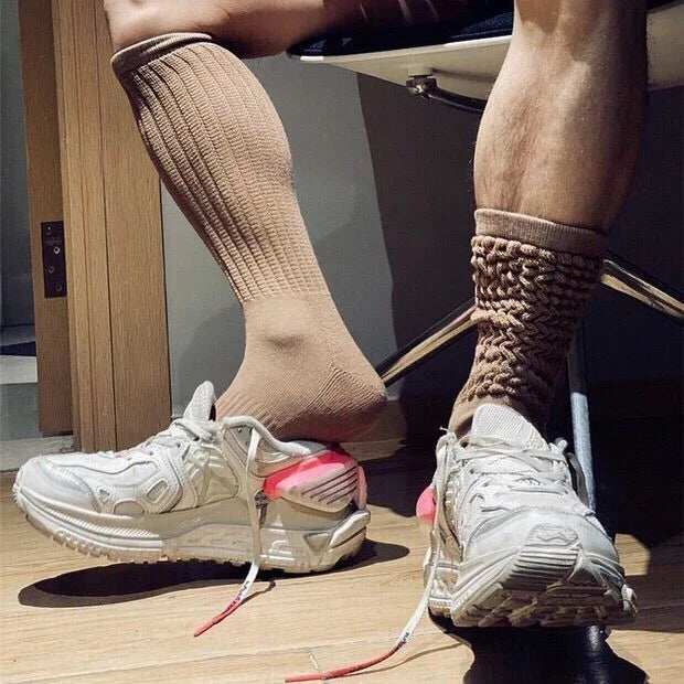 Premium men's breathable terry socks in various solid colours, offering superior moisture-wicking and comfort