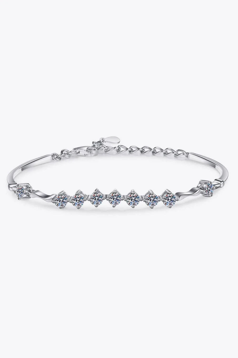Elegant moissanite and sterling silver bracelet with a rhodium plated finish, designed for sophisticated style.