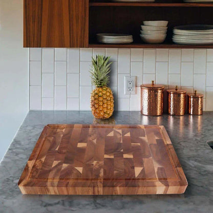 Premium Acacia wood chopping board with a convenient juice groove to catch liquids during food preparation