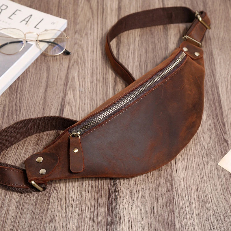 Premium one-shoulder cowhide crossbody bag for men in various colours, featuring a spacious main compartment and multiple pockets for organised storage.