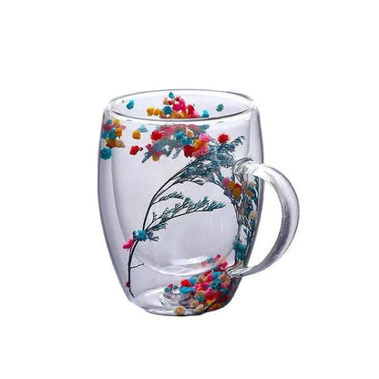 Elegant double-walled glass tea mug with captivating floral display, perfect for hot and cold beverages