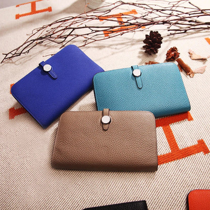 Premium cowhide leather wallet with luxurious lychee pattern design, featuring multiple compartments for secure storage and organisation.