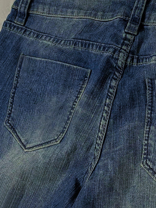 Premium British denim skinny jeans with a tailored fit, stretch fabric, and timeless blue wash