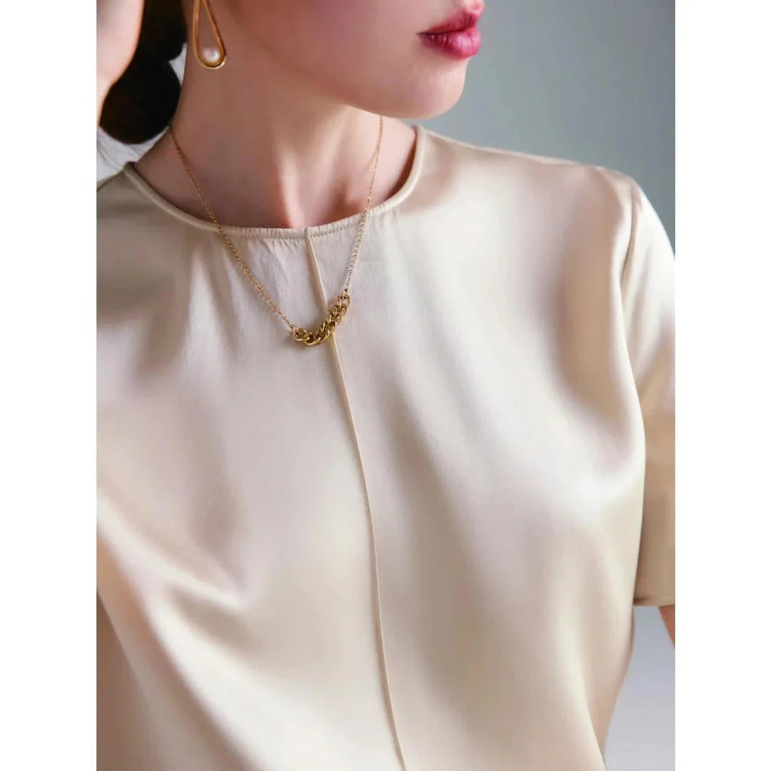 Elegant women's summer tee made of premium mulberry silk with classic O-neck design and short sleeves