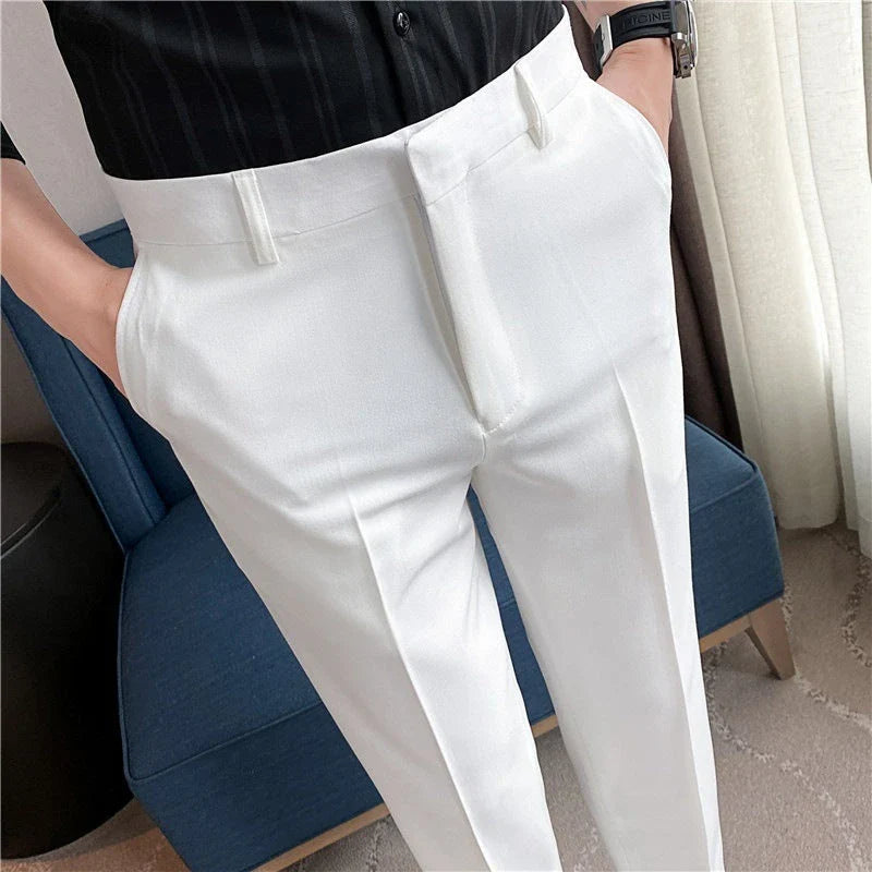 Premium men's suit trousers in a variety of colours, featuring a subtle textured drape and exceptional stretch for all-day comfort and style.
