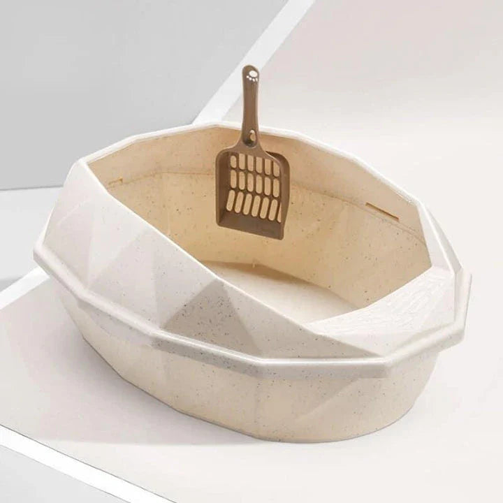 A stylish, crystal-shaped detachable semi-enclosed cat litter tray in pink colour, designed to provide privacy and reduce litter scatter for your feline friend.