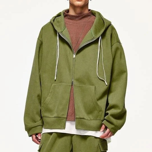 A premium British cotton and polyester hoodie jacket with a zip-up design, featuring a relaxed, oversized fit for everyday comfort and style.