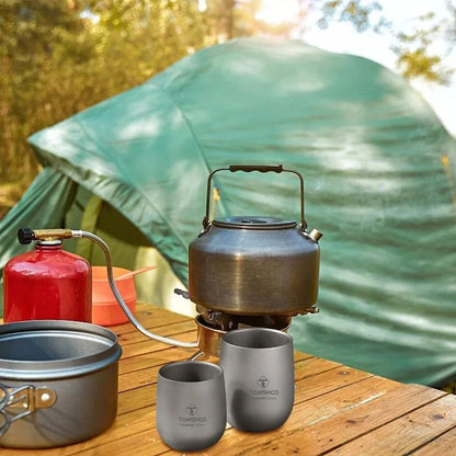 Robust and insulated titanium camping mug with double-wall design for maintaining optimal temperature of hot and cold beverages during outdoor activities