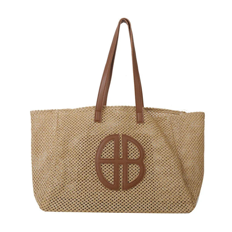 A handmade straw tote bag with a unique hollow-out knitting design, featuring a soft faux fur lining and a spacious interior for versatile use.