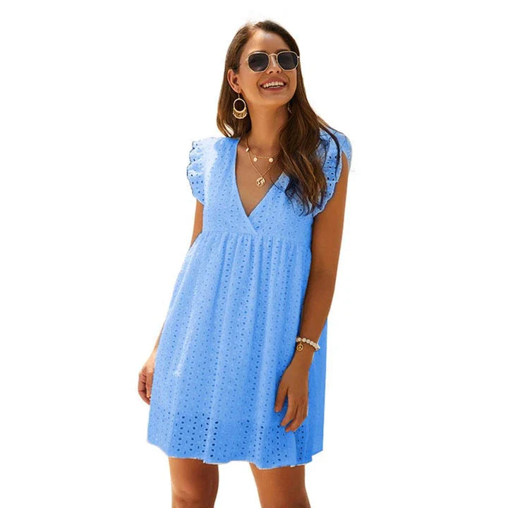 Elegant white lace dress with a flattering silhouette, perfect for British casual occasions