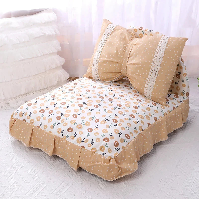 Cosy bow-accented pet bed with a detachable cushion, providing a luxurious and stylish sleeping retreat for small to medium-sized dogs and cats.