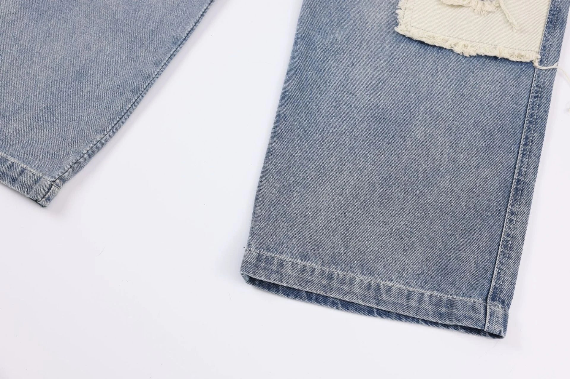 Premium heavy-duty straight-fit British denim jeans with distressed detailing and a versatile silhouette