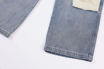 Premium heavy-duty straight-fit British denim jeans with distressed detailing and a versatile silhouette