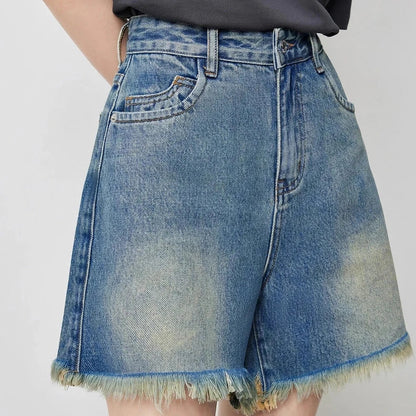 Vintage-inspired high-waisted denim shorts with tassel detailing for women