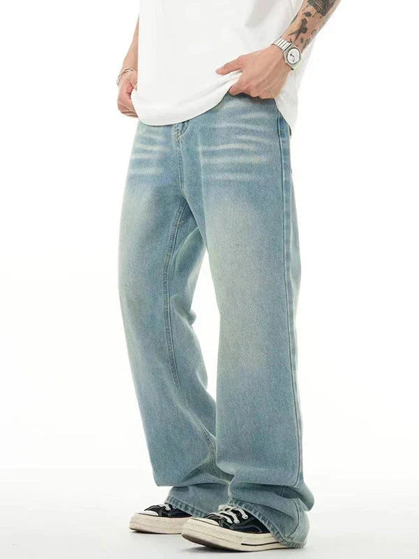 Premium light blue washed relaxed fit jeans with subtle fading and distressing, made from high-quality cotton for exceptional comfort and durability.