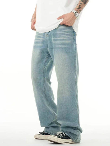 Premium light blue washed relaxed fit jeans with subtle fading and distressing, made from high-quality cotton for exceptional comfort and durability.