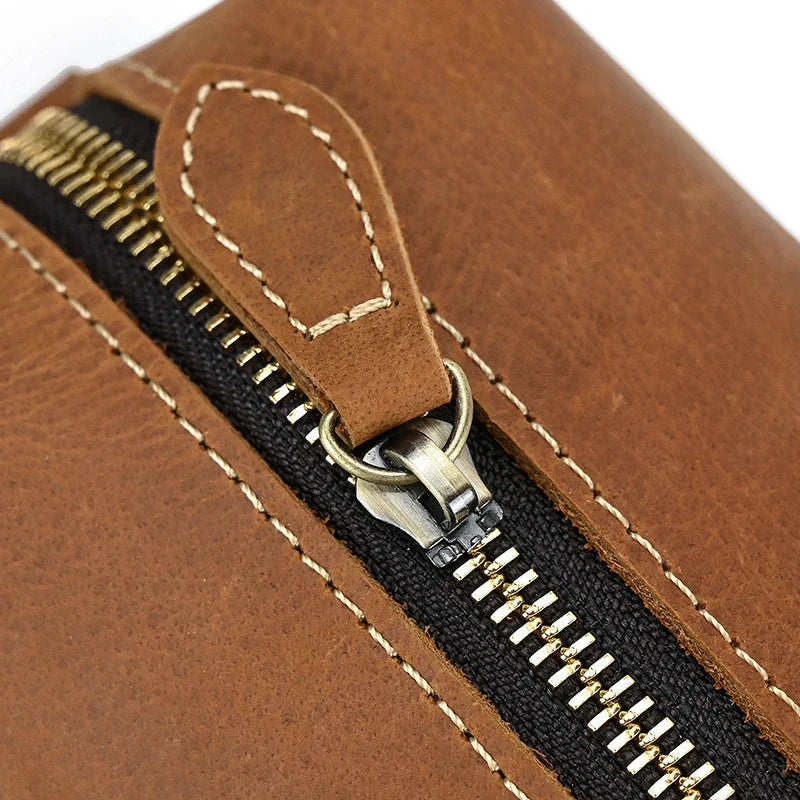 Premium leather clutch bag with multiple interior pockets, designed for the sophisticated British gentleman