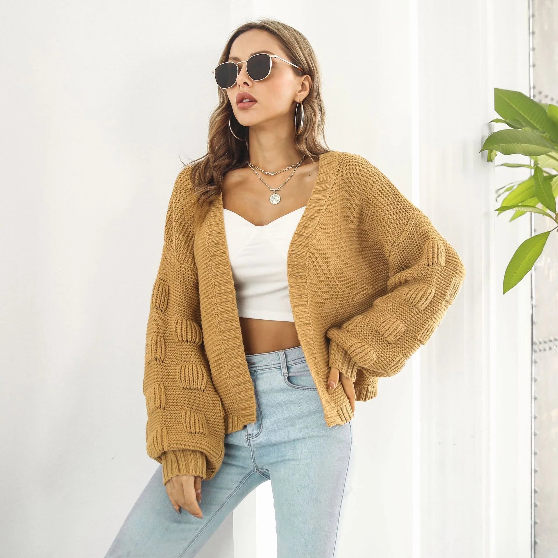 Elegant puff sleeve cardigan sweater in army green and wheat yellow colours, featuring a chunky knit design for cosy winter wear
