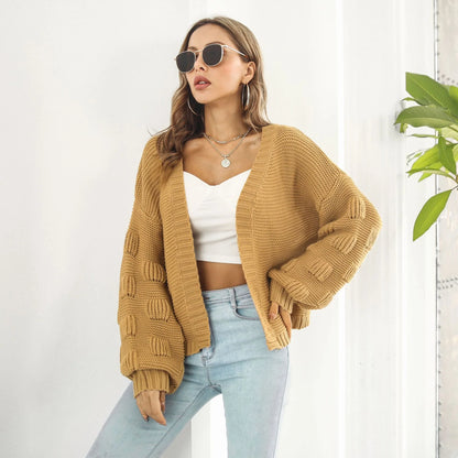 Elegant puff sleeve cardigan sweater in army green and wheat yellow colours, featuring a chunky knit design for cosy winter wear