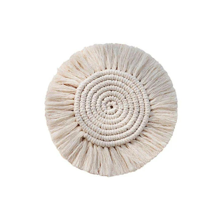 Elegant Boho Macrame Coaster in Timeless White, featuring a unique and artisanal design that adds a touch of rustic charm to any living space.