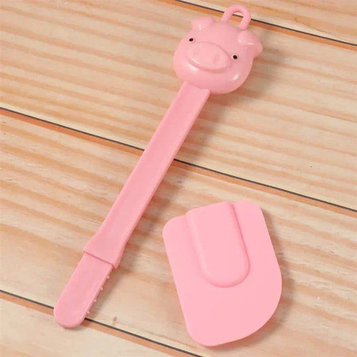 Cartoon pig-shaped silicone baking brush and scraper set for evenly applying oils and removing excess ingredients