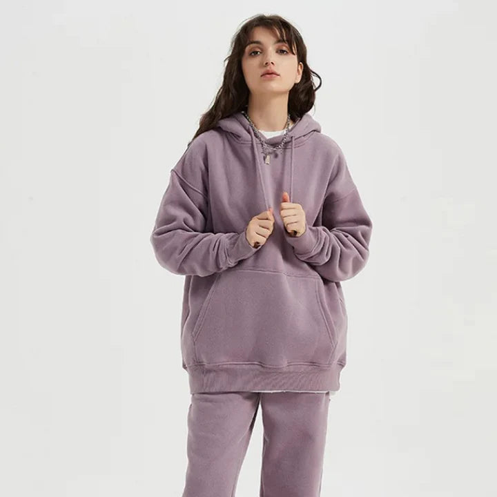Cosy fleece hoodie and jogger set in light pink, grey, and navy blue colours for ultimate comfort and style