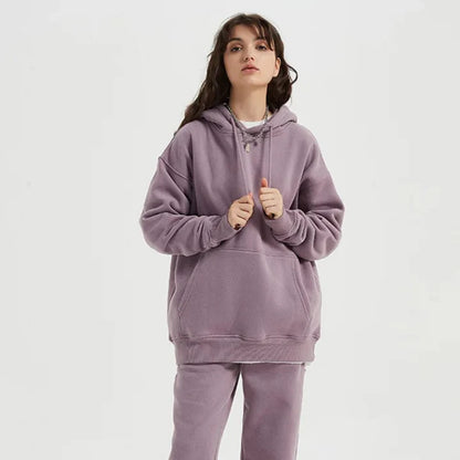 Cosy fleece hoodie and jogger set in light pink, grey, and navy blue colours for ultimate comfort and style