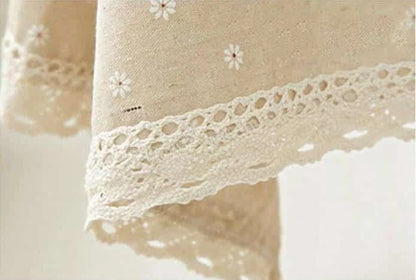 Elegant floral linen tablecloths in various sizes, perfect for dining and entertaining in the British style.