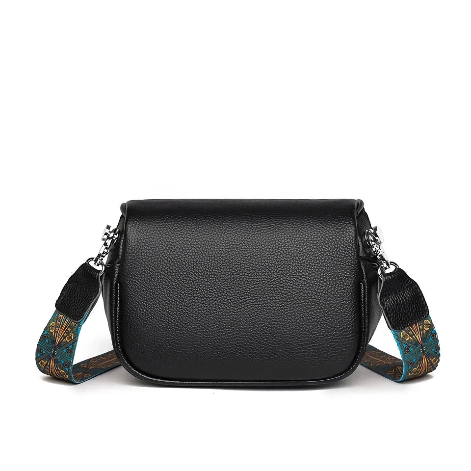 Premium genuine leather tote bag with adjustable strap and interior compartments for fashion-forward women