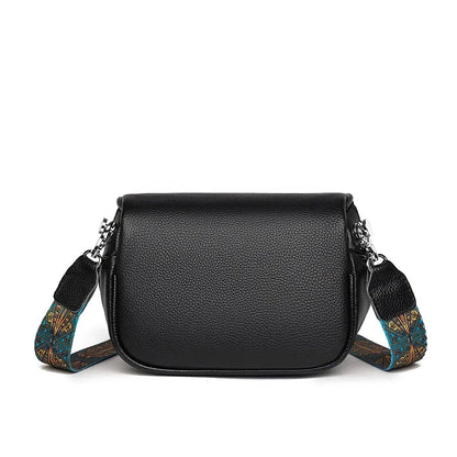 Premium genuine leather tote bag with adjustable strap and interior compartments for fashion-forward women