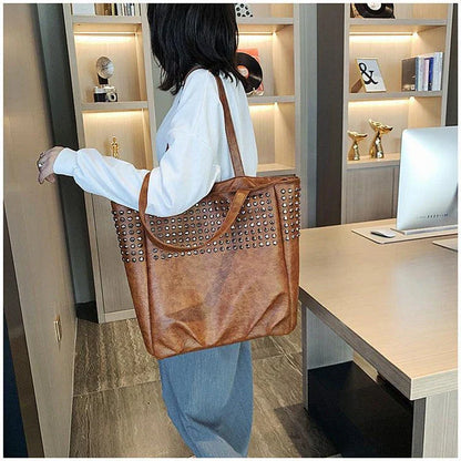 Premium British leather tote bag in black, featuring a large capacity design and stylish, versatile appeal.