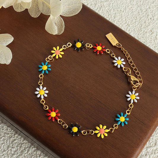 Bohemian-inspired stainless steel flower necklace and bracelet set in vibrant colours