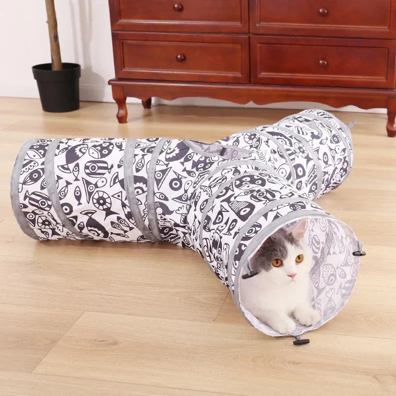 Foldable interactive pet tunnel made of durable polyester in black and white, designed for cats, rabbits, and other small animals to explore and play