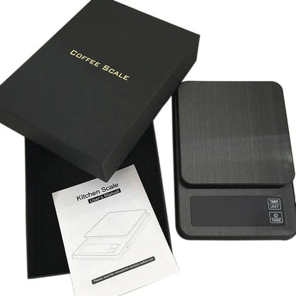 Premium digital coffee scale with LCD display, timer, and stainless steel platform for precise brewing control