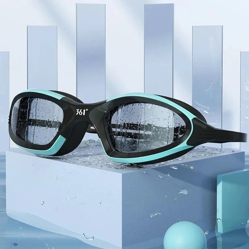 A pair of high-performance anti-fog, waterproof swimming goggles with polycarbonate lenses and a flexible silicone frame, designed for optimal clarity and comfort during swimming activities.