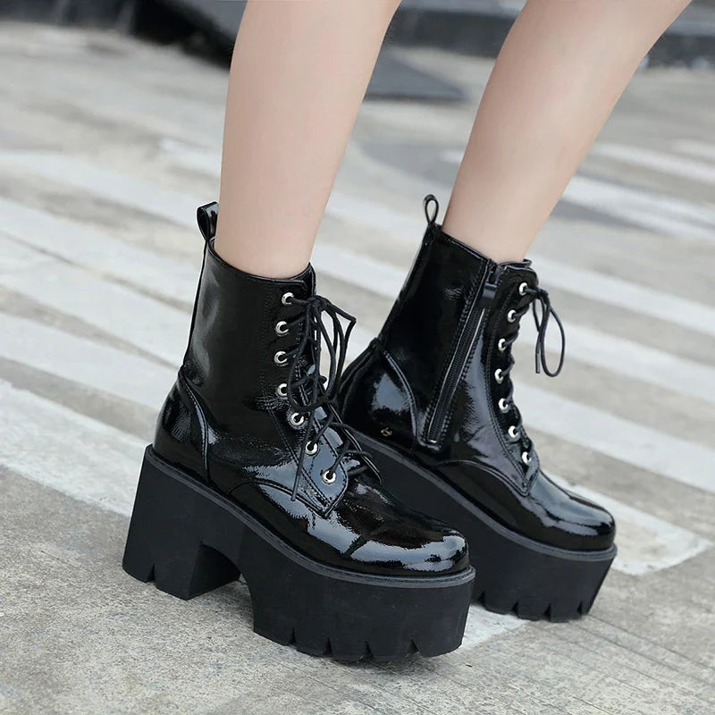 Premium lace-up high heel ankle boots in black, featuring a secure closure, supportive heel, and sleek, sophisticated silhouette.