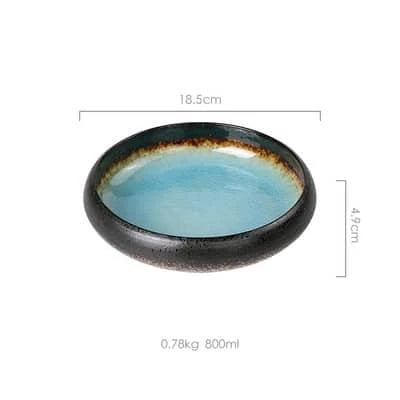 Elegant ice-inspired ceramic platter with a captivating split-glaze finish, showcasing the beauty of British craftsmanship