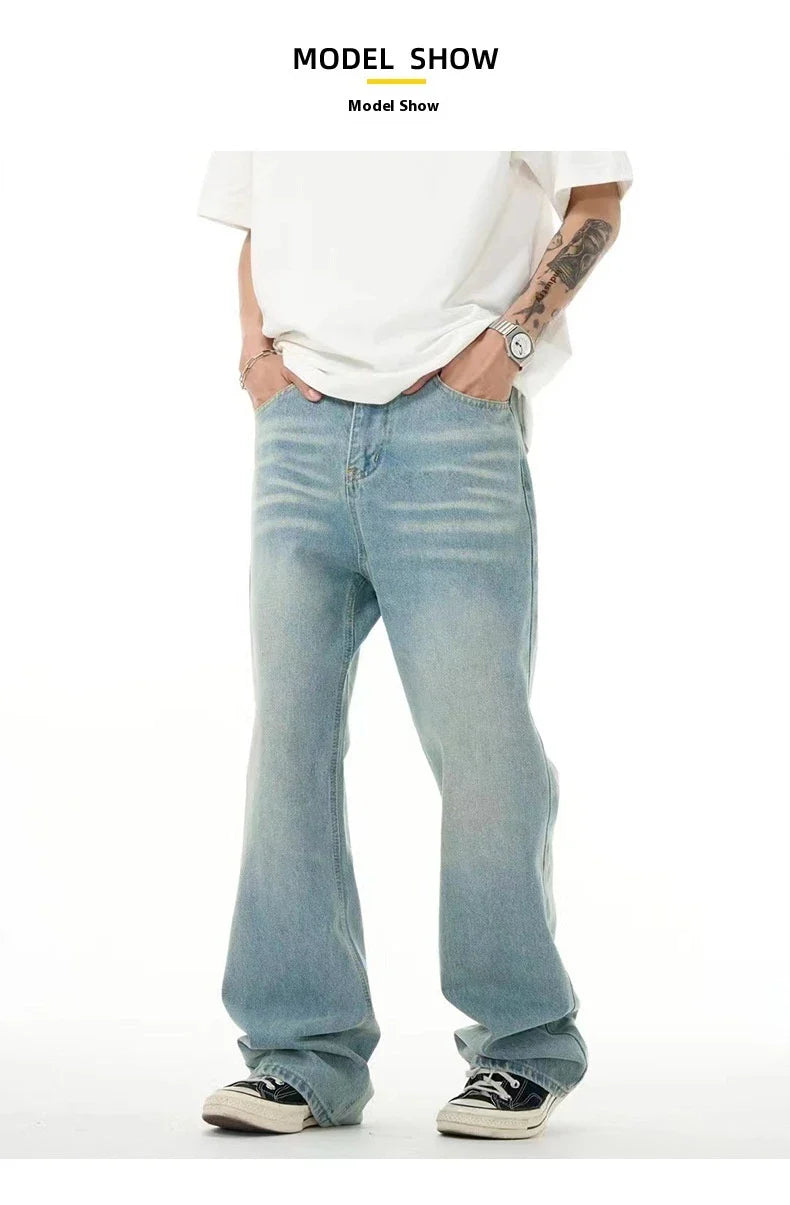 Premium light blue washed relaxed fit jeans with subtle fading and distressing, made from high-quality cotton for exceptional comfort and durability.
