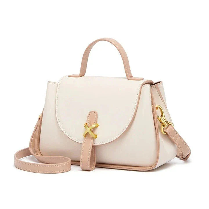 Luxury leather shoulder bag for women, featuring a sleek design, spacious interior, and premium split leather construction.
