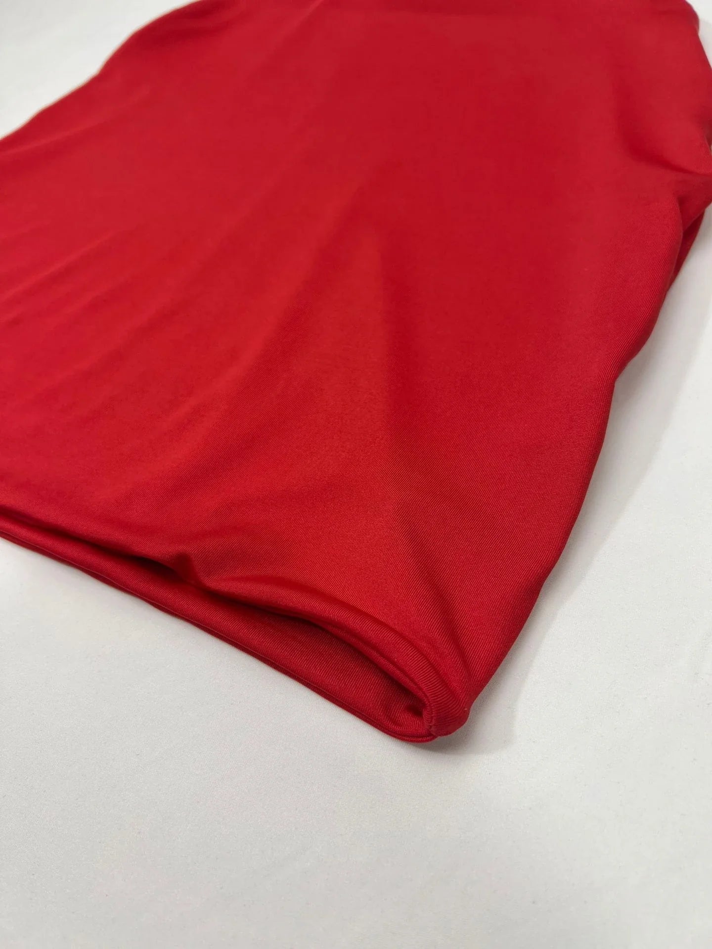 A chic backless halter dress made from premium milk silk with cut-outs at the hips, perfect for formal or semi-formal events.