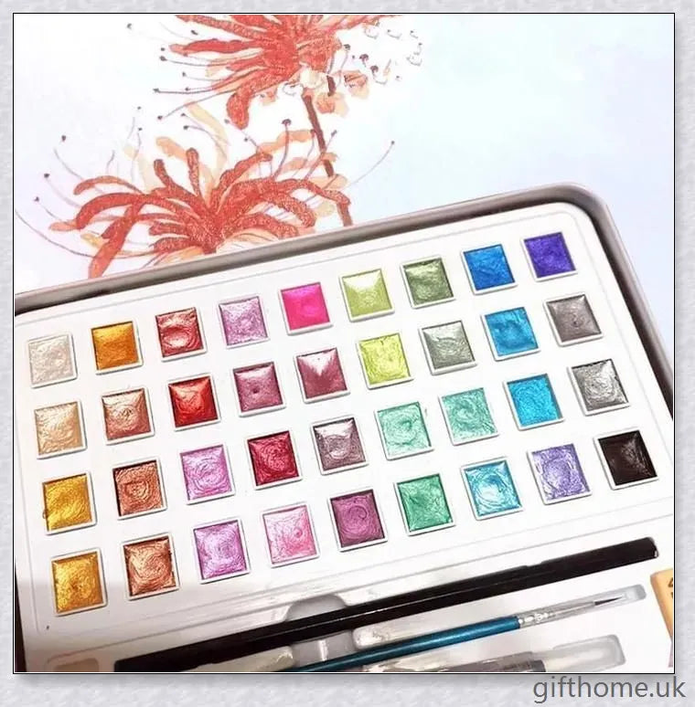 A set of vibrant watercolour paints with a glittering, iridescent effect, including brushes, a palette, and paper for a complete painting experience.