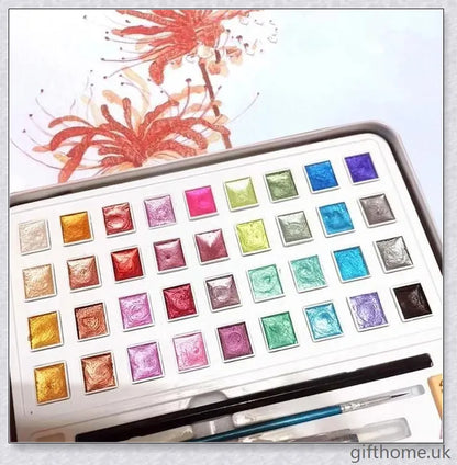 A set of vibrant watercolour paints with a glittering, iridescent effect, including brushes, a palette, and paper for a complete painting experience.