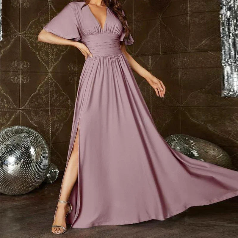 A premium long formal dress with a sophisticated V-neck design, crafted with high-quality polyester fabric in a range of elegant colours.