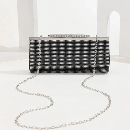 Glamorous gold rhinestone evening clutch with elegant chain and diamond decorations, perfect for UK special occasions