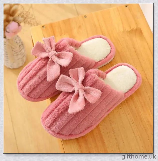 Cosy cotton house slippers with bow detail, available in a variety of colours for indoor comfort and style