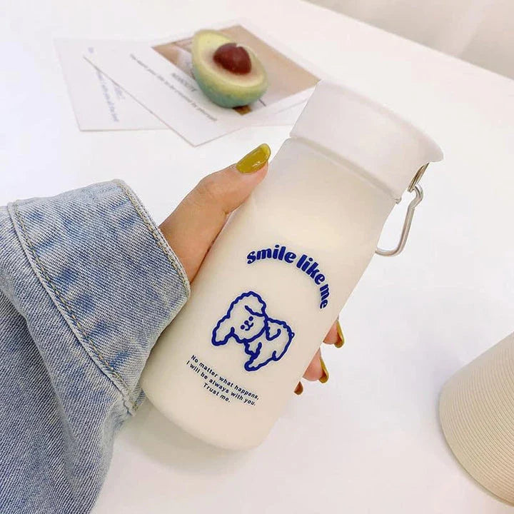 A frosted plastic water bottle with a cartoon dog design, perfect for everyday hydration and a fun, playful look.